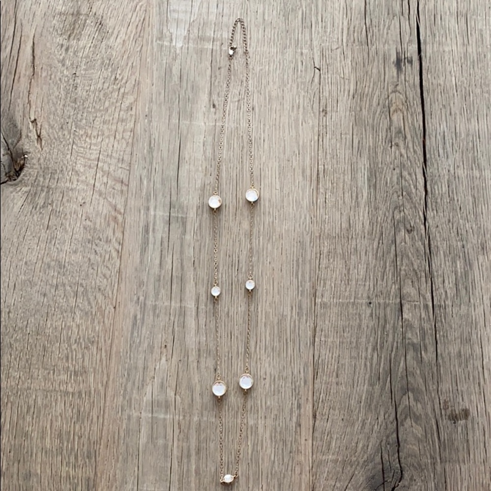 Long necklace with clear gemstones